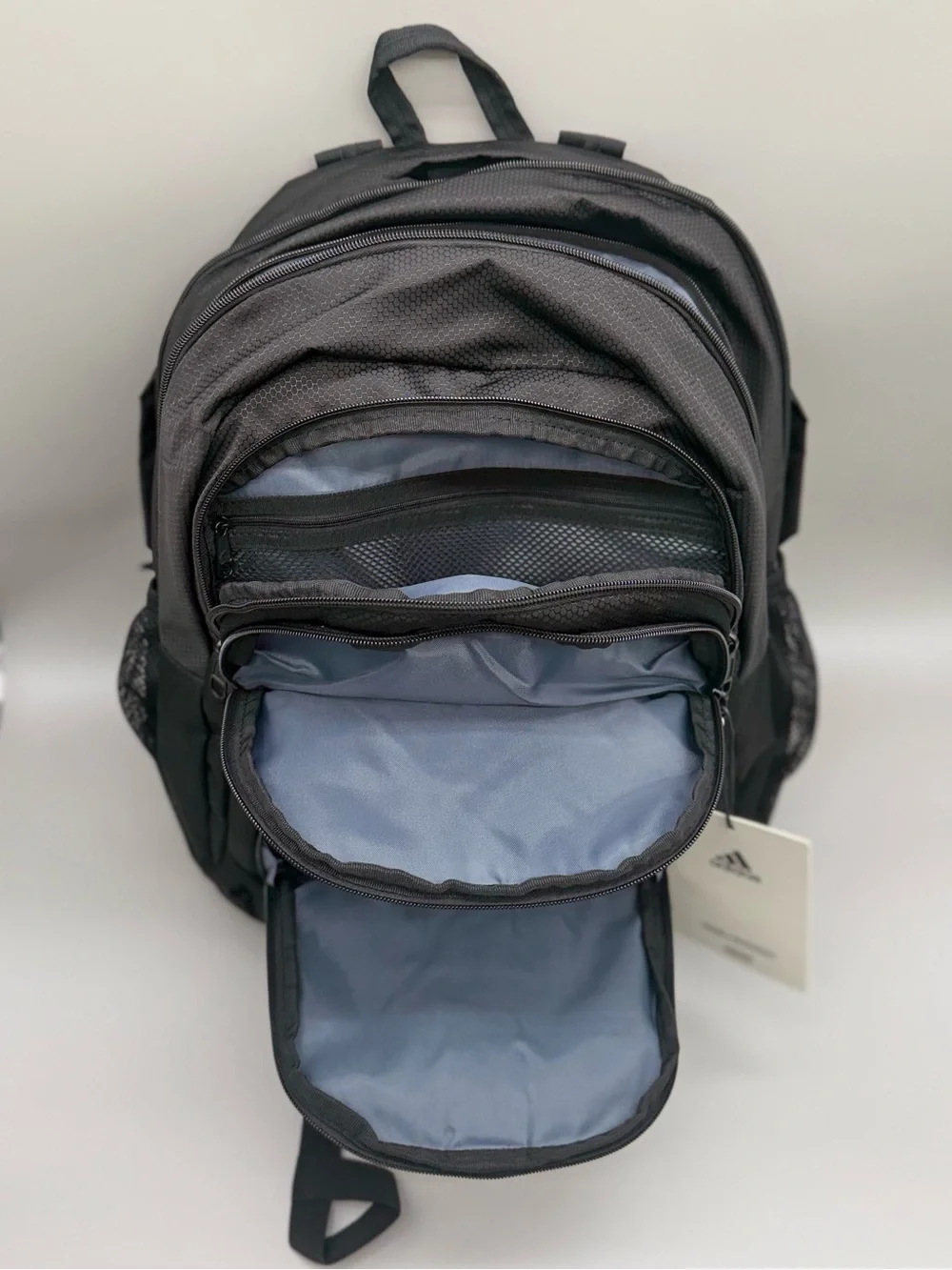 Adidas Black Backpack with Front Organizer and lap top storage.